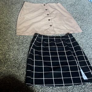 Two skirts both hardly worn.